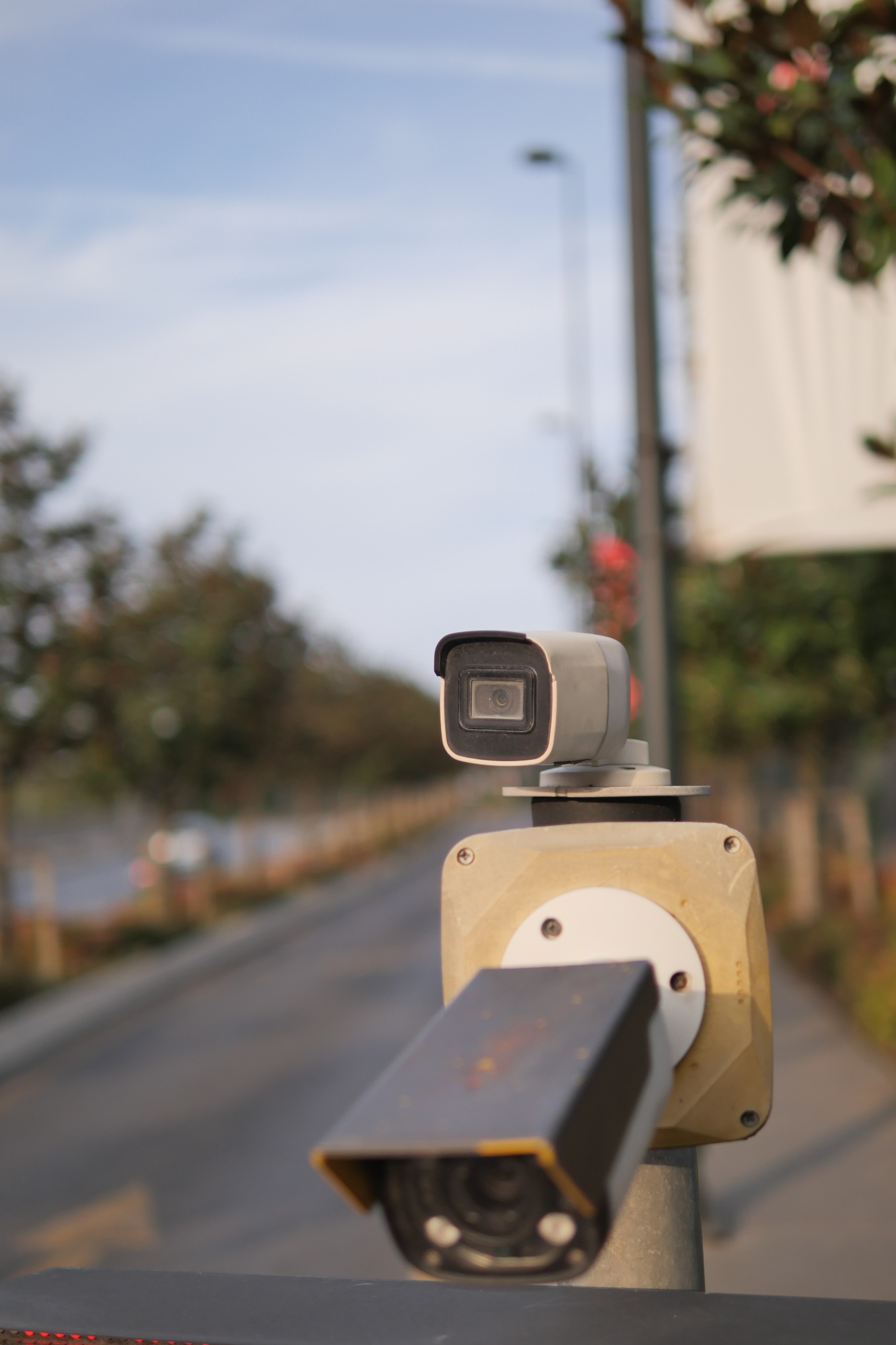 Urban security camera placements near vehicles captured in video footage